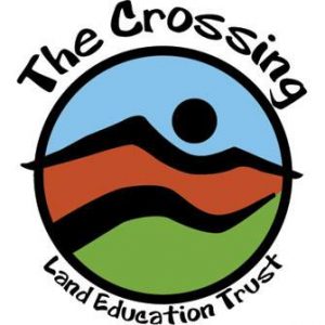 The Crossing Land logo