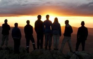 Young people and adventure sunsets with The Crossing Land